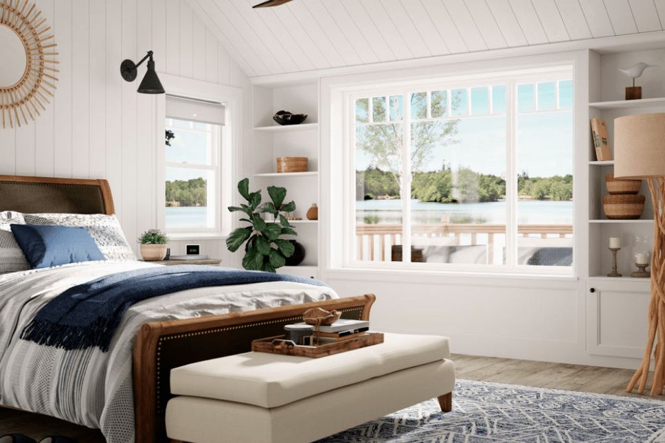 Energy-efficient windows letting light into a bedroom.